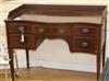 An Edwardian inlaid mahogany serpentine washstand W.107cm                                                                              