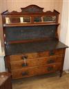 A late Victorian walnut washstand, with black marble top and splash back W.118cm                                                       