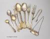 Nine items of assorted 19th century and later silver flatware and a silver 'Whiskey' wine label, 9.5oz.                                                                                                                     