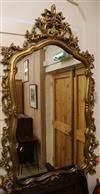 A gilt rococco framed wall mirror W.90cm                                                                                               