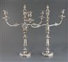 A pair of 19th century Sheffield plate two branch three light candelabra, 52.5cm.                                                      