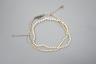 An Edwardian single strand graduated natural saltwater pearl necklace, with sapphire and diamond chip set clasp, 38cm, gross weight 5.7 grams, with accompanying Gem & Pearl Laboratory report dated 1/2/2022.              
