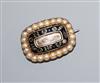 A William IV yellow metal, enamel and split pearl mourning brooch with inscription "James Peter Burrell Obt May 20th ,                 
