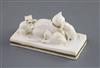 A Rockingham porcelain group of a cat and three kittens, c.1826-30, L. 11cm                                                            