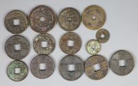 China, a group of 14 bronze coin charms or amulets, Qing dynasty,                                                                      