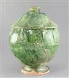 A Chinese green glazed pottery jar and cover, Yuan dynasty (1271-1368), height 34.5cm                                                  