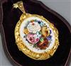 A Victorian micro-mosaic oval pendant depicting roses and mixed flowers, with ornate frame and hinged locket back 55mm.                