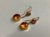 A pair of yellow metal and two stone citrine set drop earrings                                                                                                                                                              