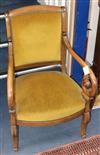 A French Empire mahogany scroll arm fauteuil                                                                                           