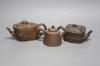 Three Chinese Yixing teapots                                                                                                                                                                                                