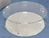 A contemporary glass circular coffee table, with mirrored base, 98 cm wide, 33 cm high                                                                                                                                      