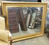 A large reproduction Victorian style gilt framed wall mirror, width 150cm, height 124cm                                                                                                                                     