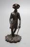 A Regency bronze tobacco box, surmounted by a figure of Dr. Syntax - 20cm tall                                                                                                                                              