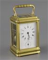 A late 19th century lacquered brass hour quarter repeating carriage alarum clock, width 3.25in. depth 3in. height 5in.                 