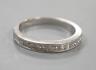 A platinum and twelve stone diamond set half eternity ring, size R, gross weight 6.4 grams.                                                                                                                                 