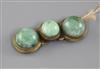 A Chinese gilt metal and jadeite mounted belt buckle, 19th century, 9cm long                                                           