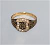 An early 19th century 18ct gold, black enamel and seed pearl set mourning ring,                                                        