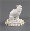 A rare Rockingham porcelain figure of a seated cat, c.1826,                                                                            