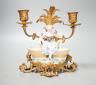 A 19th century Meissen figural salt, incised number 3024, on ormolu candle stand. Total height - 21cm                                                                                                                       