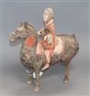 A Chinese painted pottery funerary equestrian figure, believed to be Western Han Dynasty, H 32cm                                       