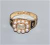 A Victorian 18ct gold, black enamel, plaited hair and split pearl set mourning ring, with inscription, size P/Q.                       