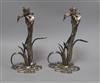 A pair of plated brass orchid candlesticks 28cm high                                                                                   