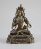 A Chinese gilt bronze figure of Amitayus, Qianlong mark and period (1736-95), 12.5 cm high                                                                                                                                  