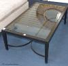 An ebonised ash and glass coffee table, 120 cm long, 70 cm deep, 40 cm high                                                                                                                                                 