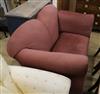 An Edwardian drop end camel back sofa W.130cm                                                                                          