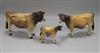 A Beswick Jersey cattle family, comprising bull 1422, cow 1345 and calf 1249D, gloss                                                   