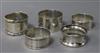 Five assorted silver napkin rings.                                                                                                     