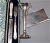 A Victorian cased silver and mother of pearl handled serving knife and fork, Sheffield, 1889, a silver cigarette case and vase.        