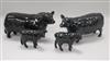 A Beswick Aberdeen Angus cattle family comprising bull 1562, cow 1563 and two calves 1406A, gloss                                      