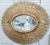 A large contemporary gilt oval 'sunburst' mirror, 145 cm wide, 130 cm high                                                                                                                                                  