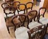 A set of five Victorian mahogany balloon back dining chairs and three similar chairs                                                   