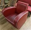 A 1960's red leather club armchair                                                                                                     