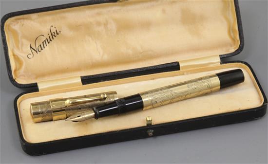 A cased Namiki 14k rolled gold fountain pen, 13cm A cased Namiki 14k rolled gold fountain pen, 13cm