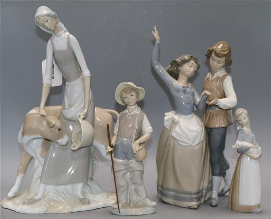 A Lladro group, Folk Dancing, No. 5256 and three other figures, H 34cm (tallest) A Lladro group, Folk Dancing, No. 5256 and three other figures, H 34cm (tallest)