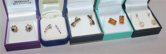 Five pairs of assorted gold and gem set earrings.