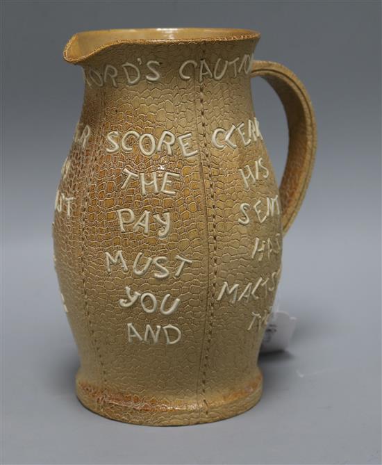 A Doulton Lambeth The Landlords Caution stoneware beer jug A Doulton Lambeth The Landlords Caution stoneware beer jug
