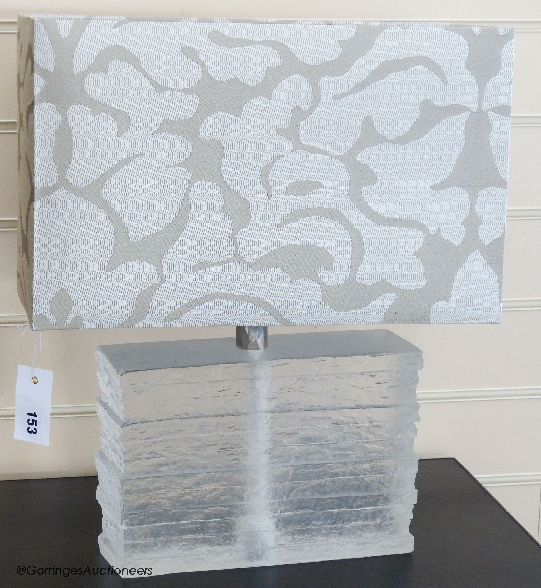 A contemporary clear acrylic slab table lamp, 25.5 cm high to light fitting, fabric shade