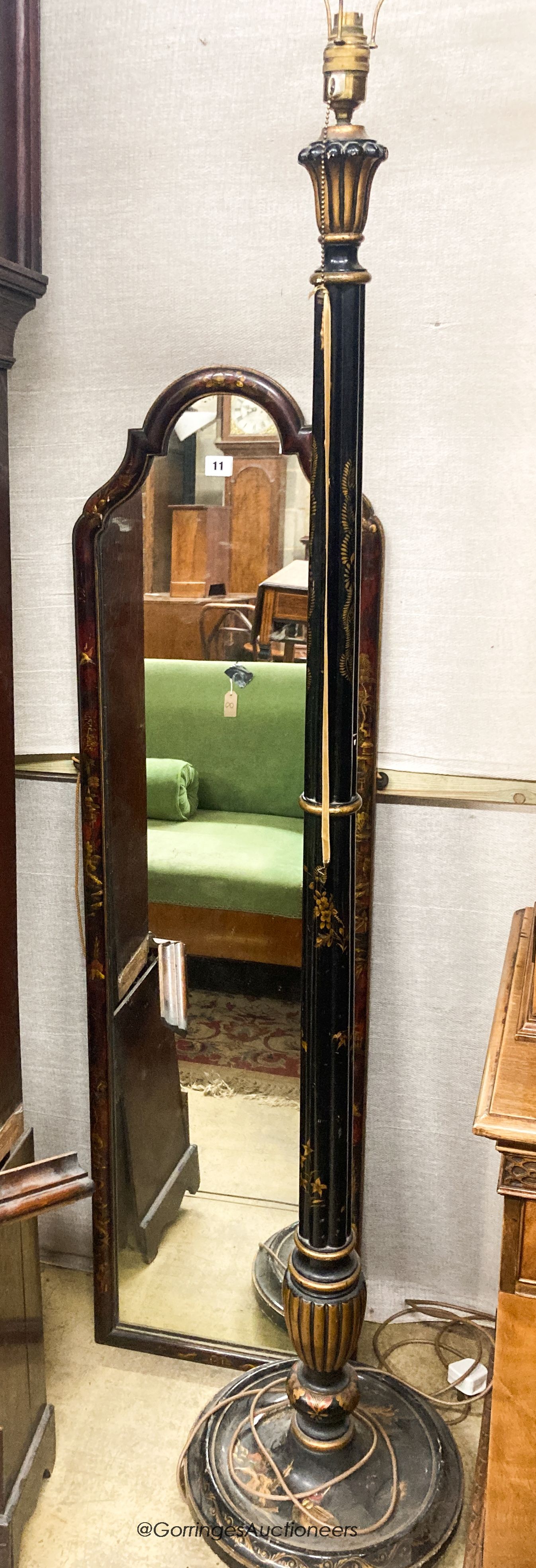 A 1930's lacquered lamp standard and a chinoserie lacquer robing mirror, W.38cm H.138cm