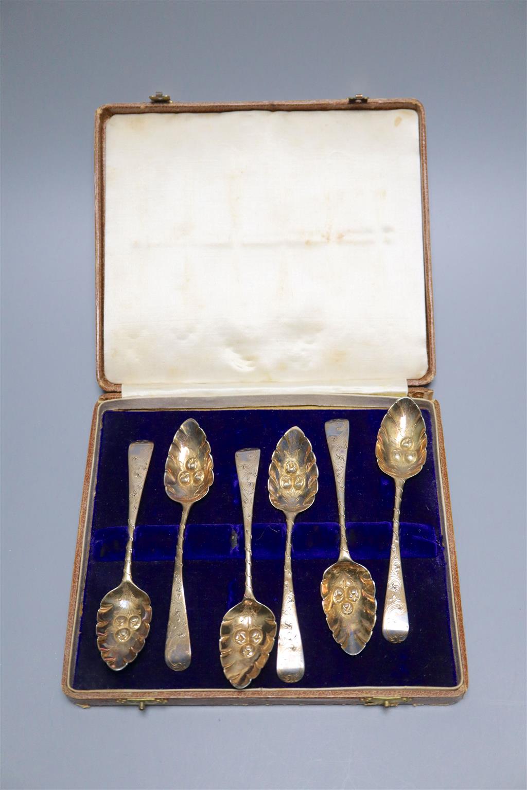 A matched set of six George III silver berry teaspoons, Alice & George Burrows, London, 1806 and George Wintle, London, 1804,
