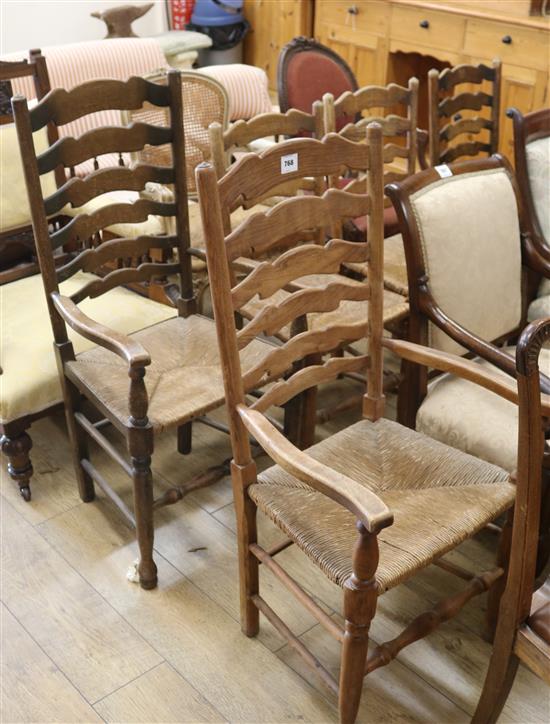 A set of five ash ladderback, rush seated dining chairs A set of five ash ladderback, rush seated dining chairs