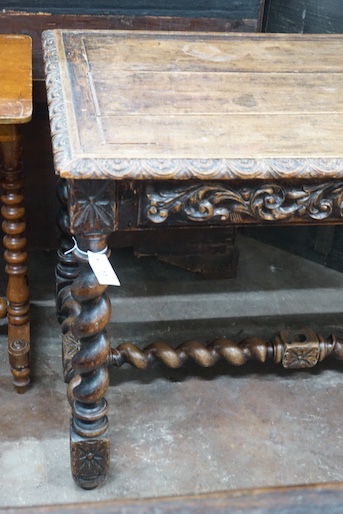 A 19th century Flemish rectangular carved oak side table, width 110cm, depth 65cm, height 74cm
