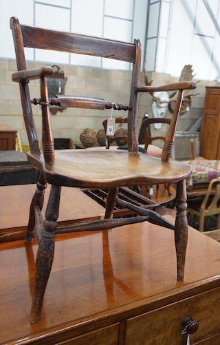 A Victorian elm and beech Windsor elbow chair, width 50cm, depth 43cm, height 84cm