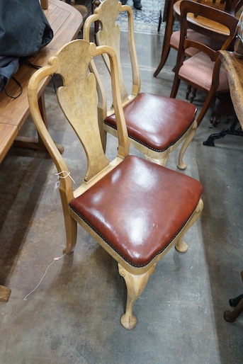 A set of four Queen Anne style pale walnut dining chairs with Merryweather plaques