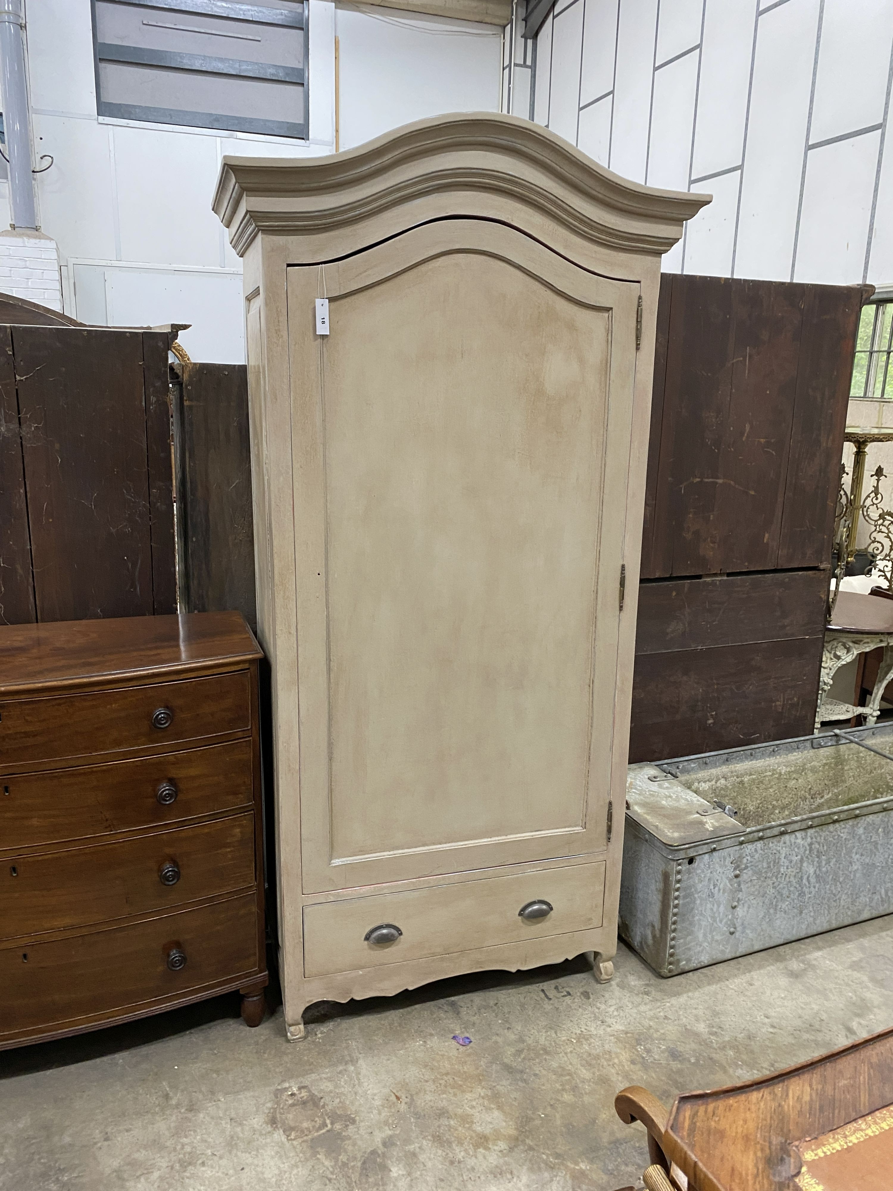 A Louis XV style white painted armoire, width 104cm, depth 58cm, height 216cm