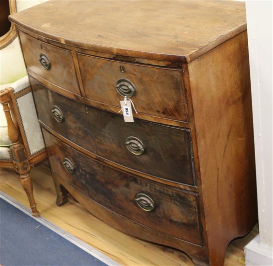 An early 19th century bowfront chest of drawers W.89cm An early 19th century bowfront chest of drawers W.89cm