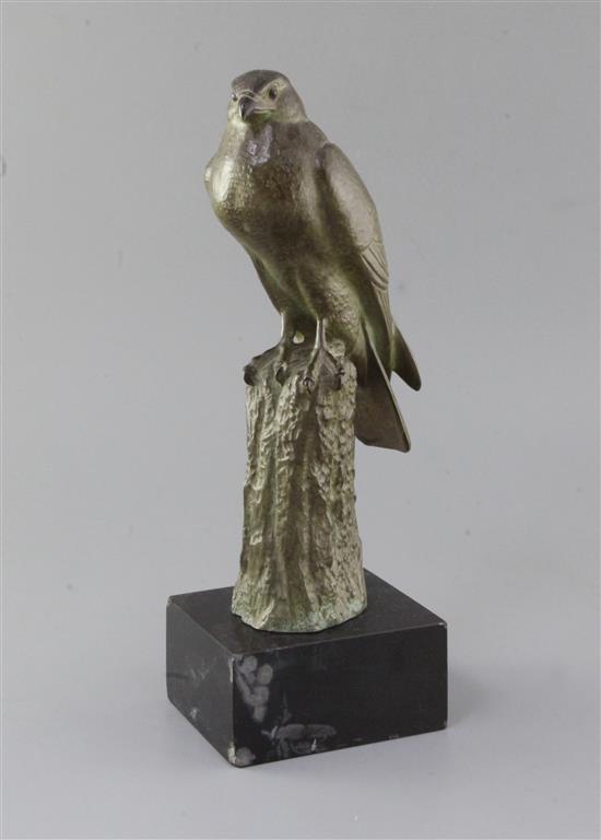 Irénée Rochard (1906-1984). A green patinated bronze model of a falcon perched upon a tree stump, 13.25in. Irénée Rochard (1906-1984). A green patinated bronze model of a falcon perched upon a tree stump, 13.25in.